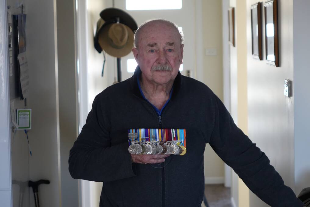 The medals of three wars. Allen Evans says that the children of war veterans are much more likely to take their own lives. His son committed suicide.
