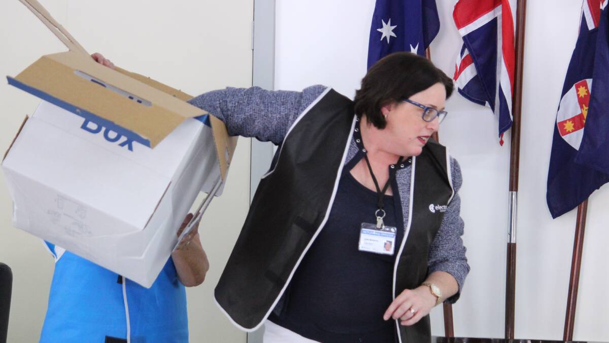 DRAW: Electoral Commission returning officer (substitute) Jodie McKenna made the draw for ballot positions at the Uralla Council Chamber on Wednesday afternoon.