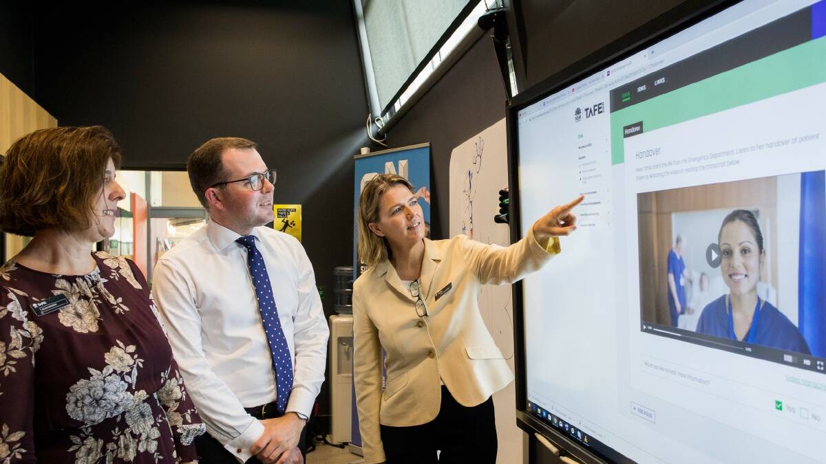 SOFTWARE: (l-r) TAFE NSW head of Skillspoint Helen Cosgrove, Minister for TAFE Adam Marshall and TAFE NSW managing director Dr Caralee McLiesh test the new online template being introduced for the Diploma of Nursing next year.