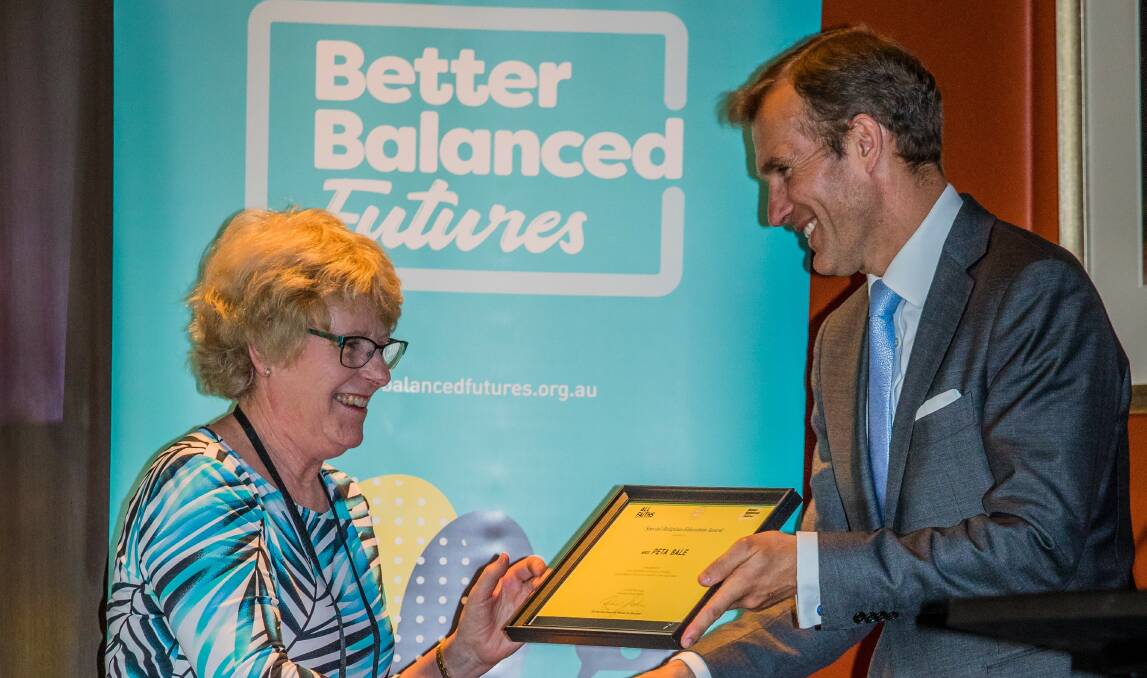 RECOGNITION: Peta Bale was recognised at an award ceremony held in Parliament on November 22. Minister for Educaltion Rob Stokes presented Peta with her award.