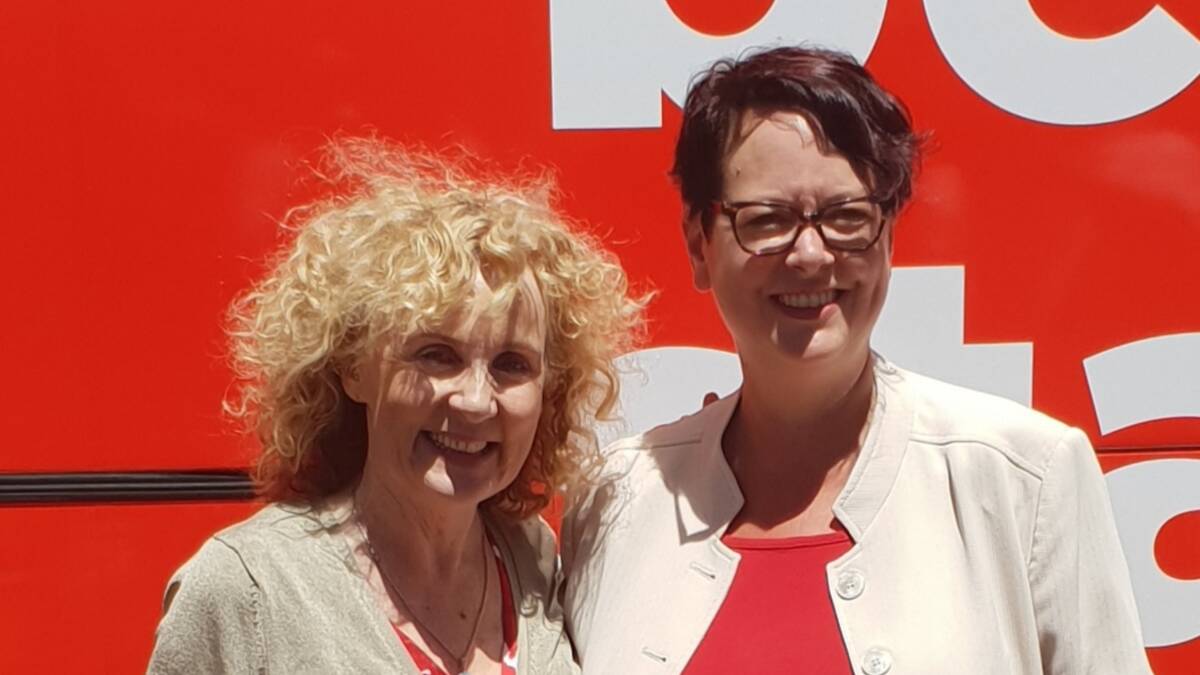 OFFICIAL: Country Labor candidate for Northern Tablelands Deb O'Brien with NSW Labor deputy leader Penny Sharpe beside the bus on Sunday.