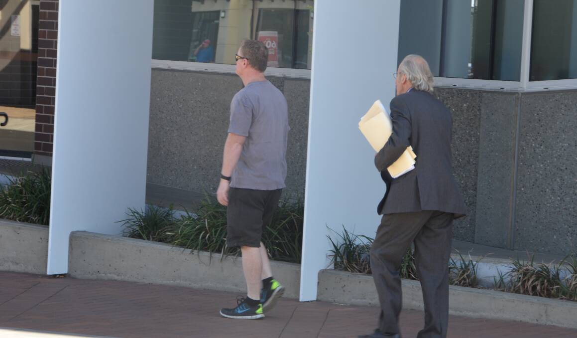 SEX ARREST: Agent solicitor for the accused woman, Clive Sharkey, pictured arriving at Armidale Local Court on Wednesday, ahead of the hearing to suppress details of the case against the suspended staff member. Photo: Armidale Express