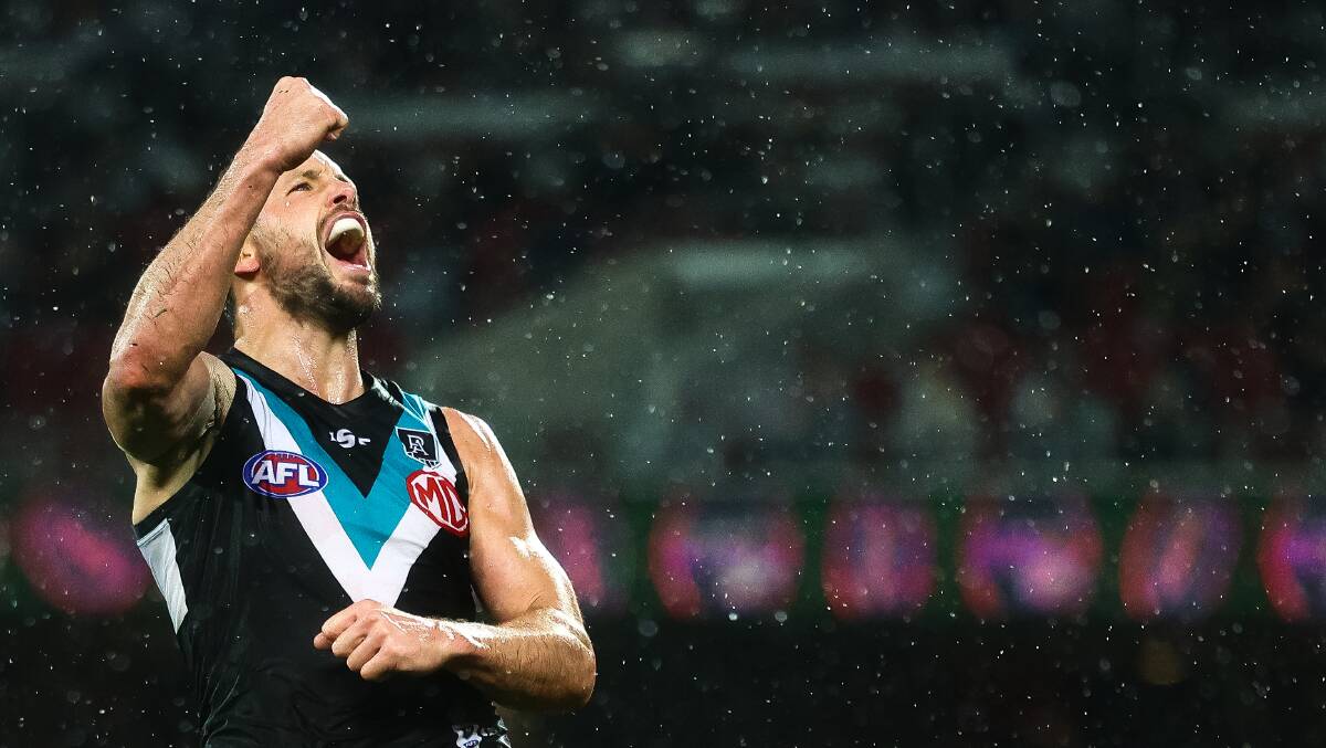 Travis Boak of the Power celebrates during the round 17 AFL match between the Port Adelaide Power and the Essendon Bombers. Picture: Getty Images
