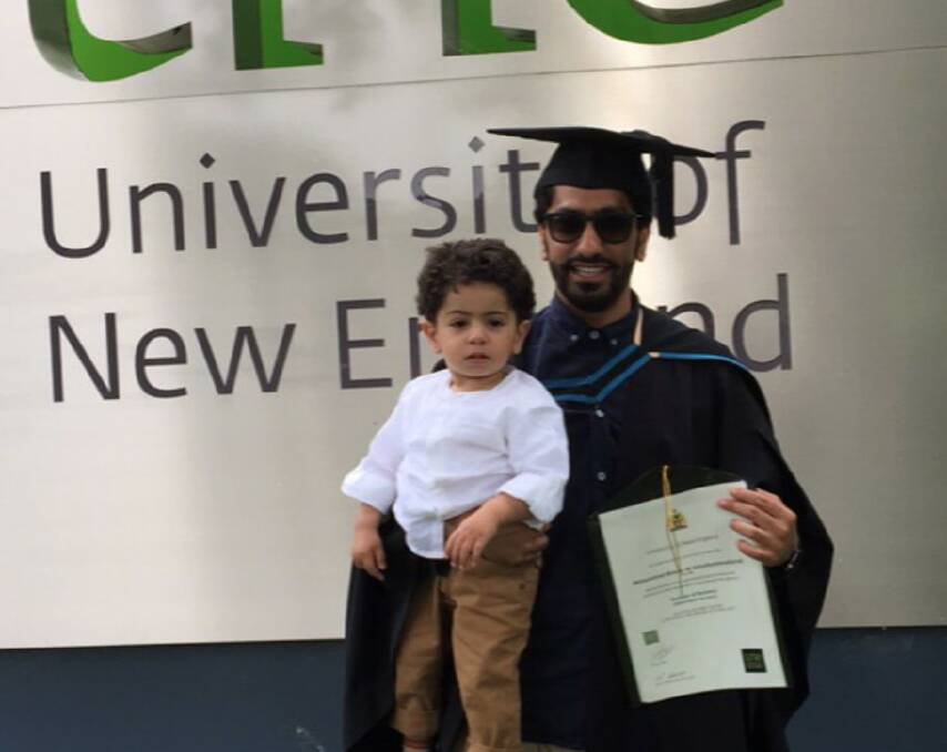 Proud father: Mohammed Ameer M Almohammedsaleh and his son at the University of New England.