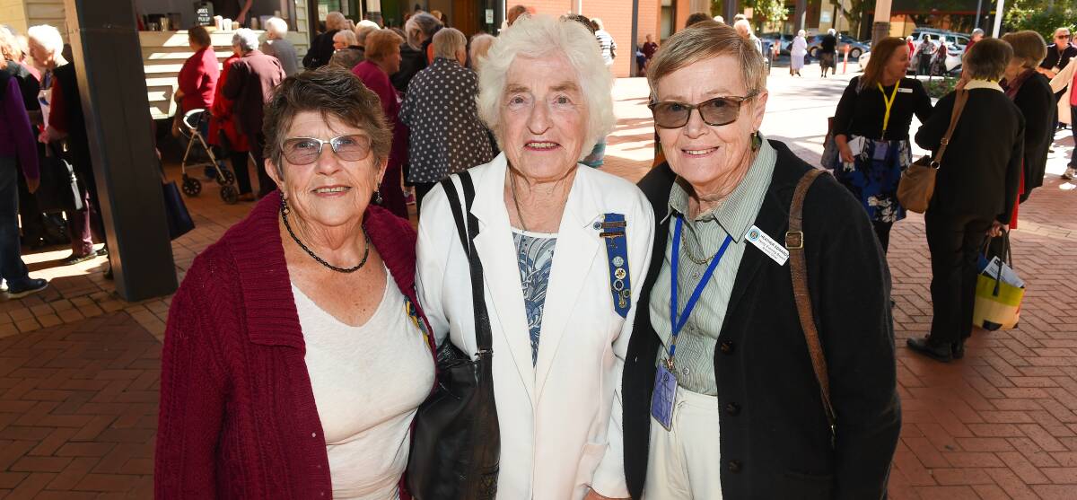 STATE GATHERING: Henty branch's Margaret Singe, of Henty branch, Leola Hull, of Cartwrights Hill (Wagga), and Henty Evening branch's Heather Edwards join CWA delegates at Albury Entertainment Centre. Picture: MARK JESSER